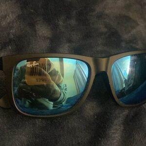 Ray-Ban Matte Black Sunglasses with Reflective Blue Lenses